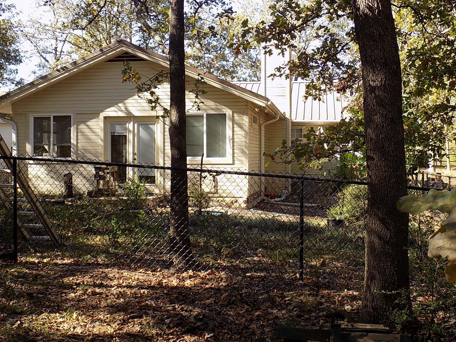 111 Laurel Lane Holly Lake Ranch, TX 75765 - Photo 9 of 43 a view of a house with a yard