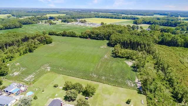 a view of a lake with a yard