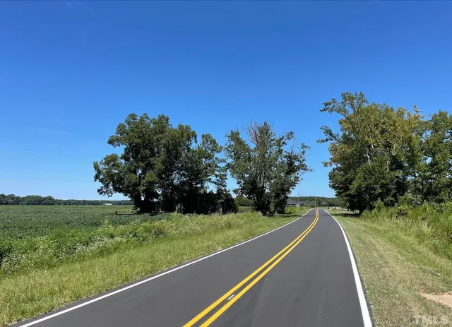 a view of swimming pool with a yard