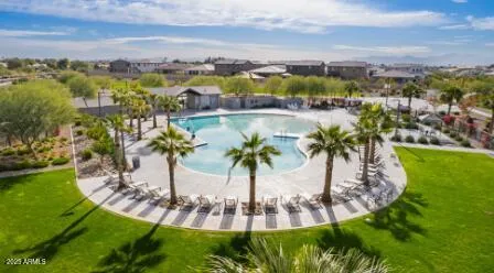 an aerial view of a house with a swimming pool