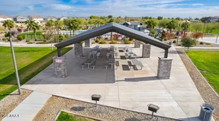 swimming pool view with a outdoor seating