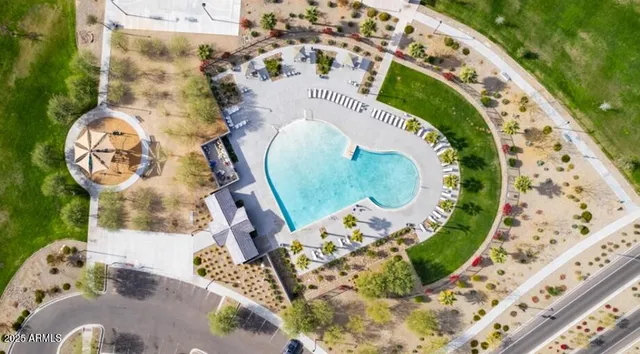 an aerial view of a swimming pool