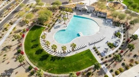 a view of a swimming pool with a lake