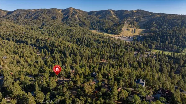 a view of a bench in a backyard