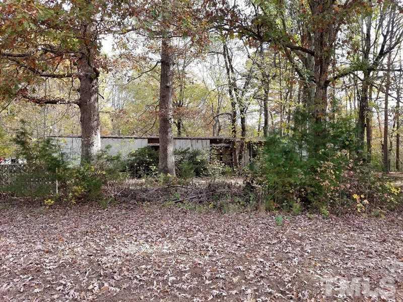 Barnette Tingen Road Roxboro, NC 27574 - Photo 2 of 3 a backyard of a house with lots of green space