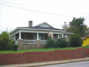 1492 Flat Creek Road Lancaster, SC 29720 - Photo 1 of 5 a front view of a house with a garden