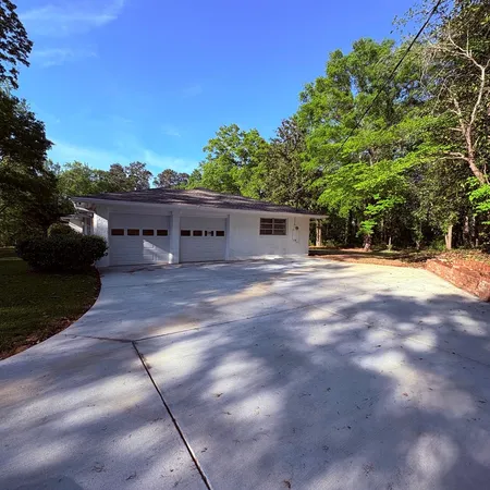 a view of house with outdoor space