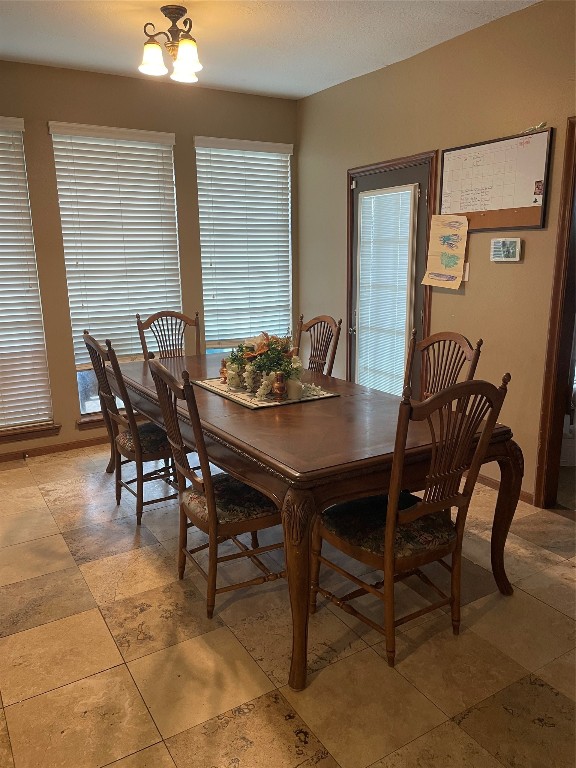 17810 Clearlight Lane Spring, TX 77379 - Photo 4 of 9 a view of a dining room and livingroom with furniture and window