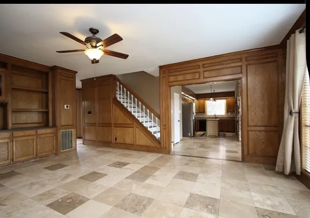 a view of a livingroom with a staircase