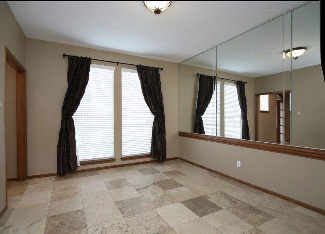 17810 Clearlight Lane Spring, TX 77379 - Photo 9 of 14 a view of an empty room with a window