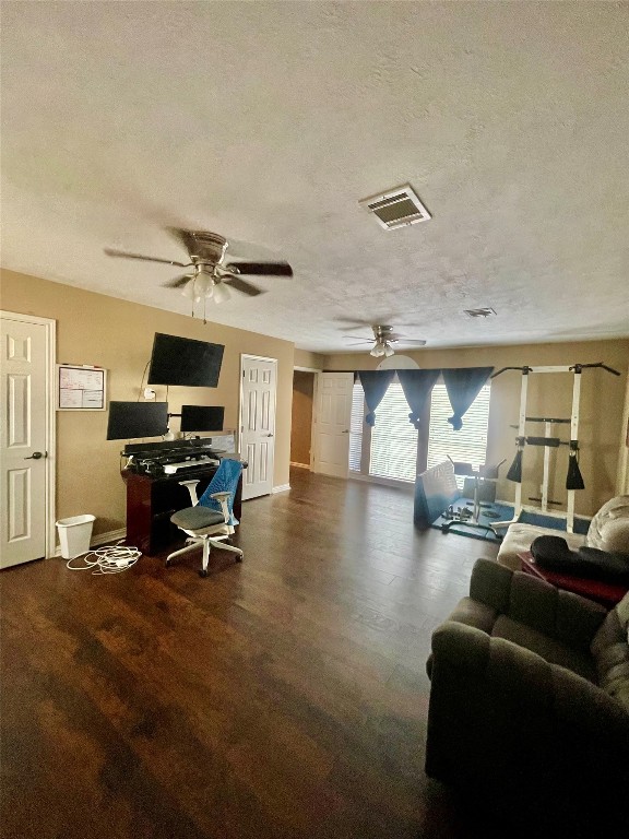 17810 Clearlight Lane Spring, TX 77379 - Photo 9 of 9 a living room with furniture and a flat screen tv