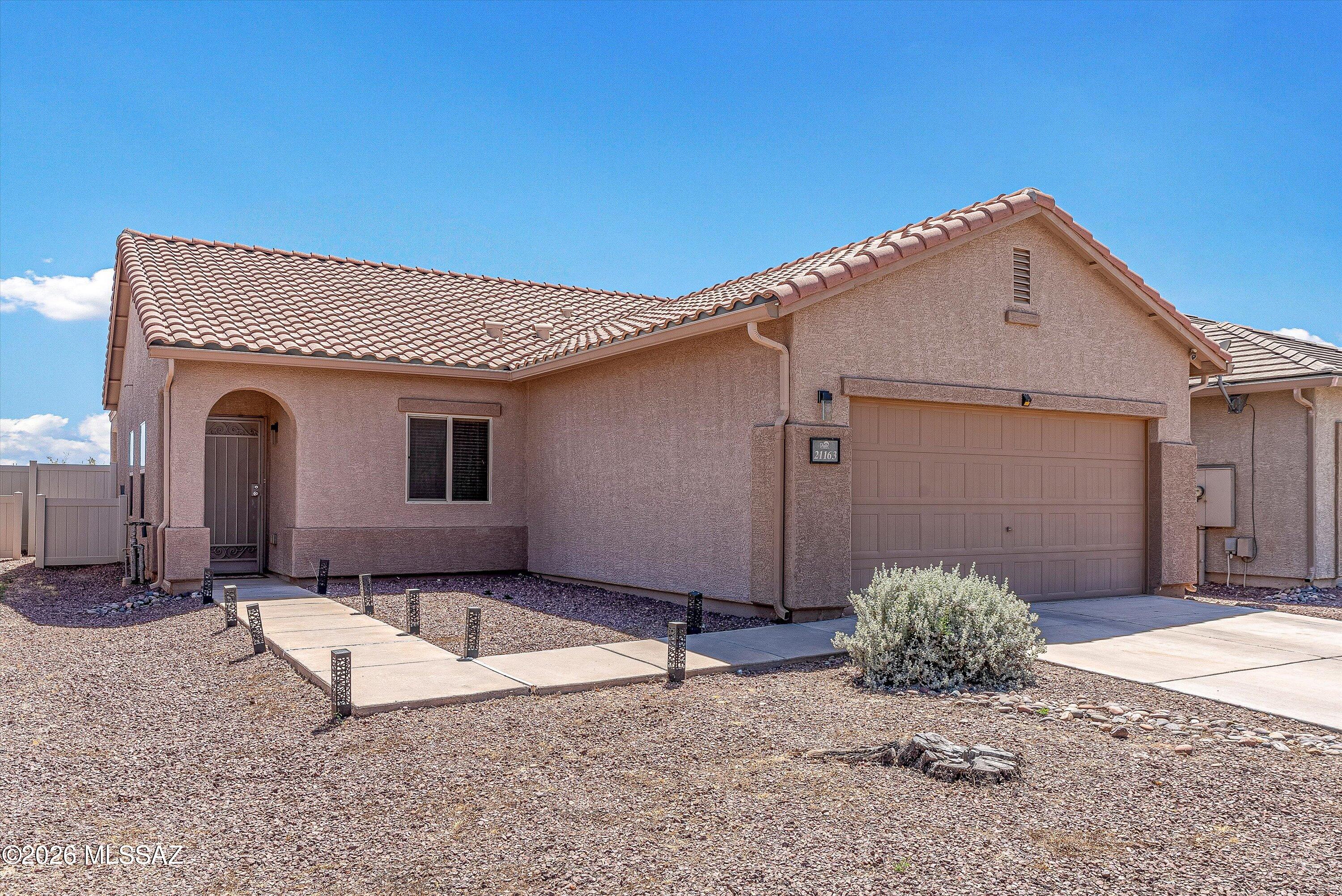 21163 East Treasure Road Red Rock, AZ 85145 - Photo 3 of 35 a front view of a house