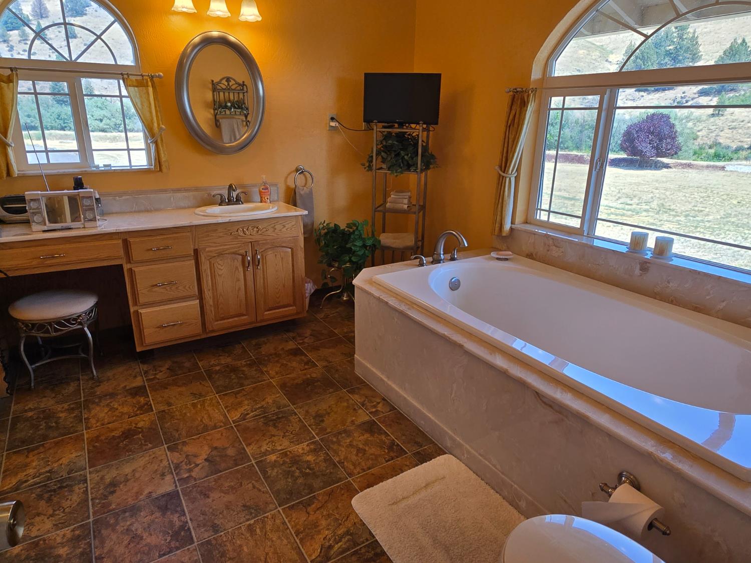 4204 Highway 263 Yreka, CA 96097 - Photo 23 of 66 a room with a baby bed furniture and a large window