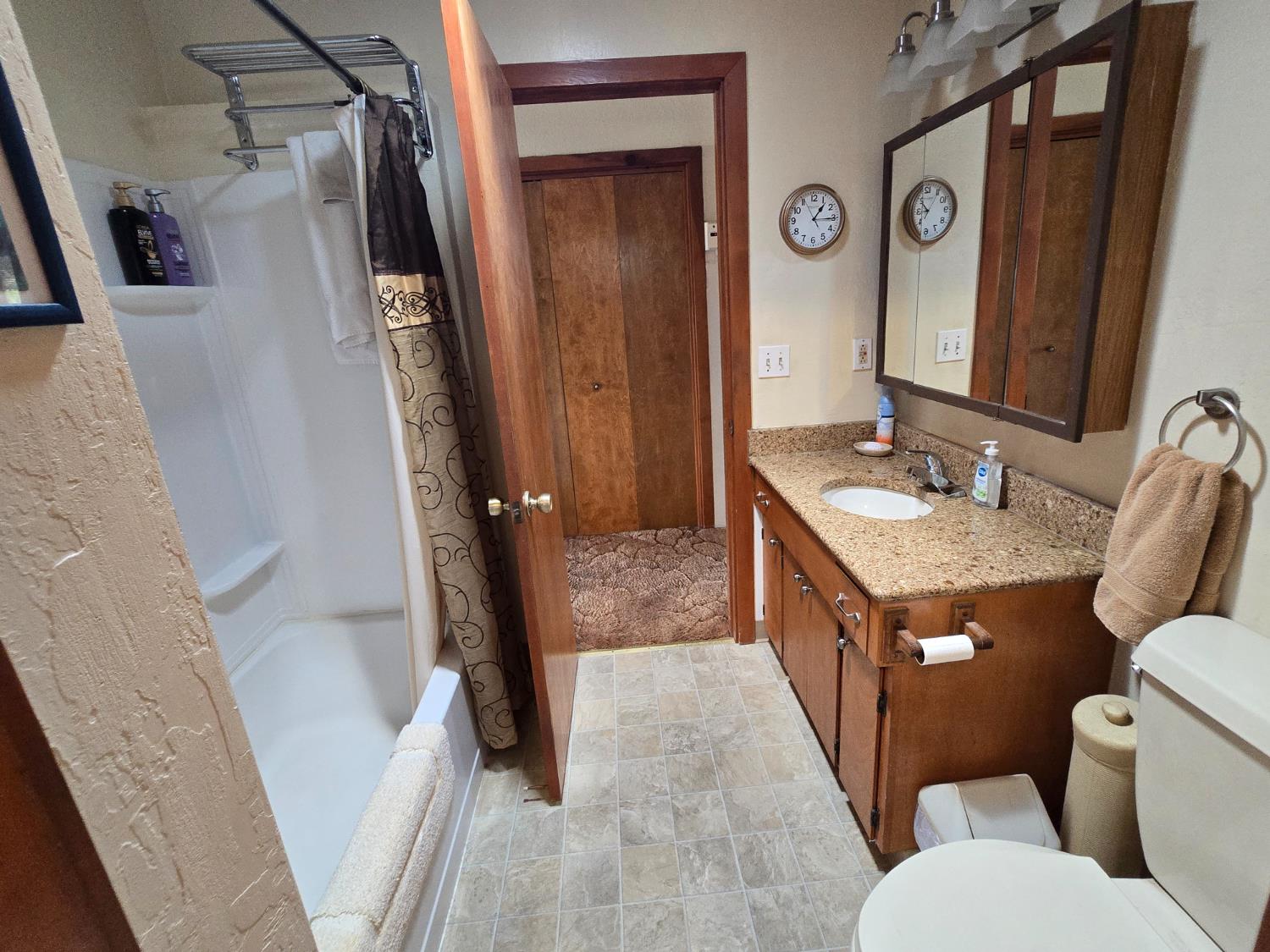 4204 Highway 263 Yreka, CA 96097 - Photo 30 of 66 a bathroom with a double vanity sink and a mirror