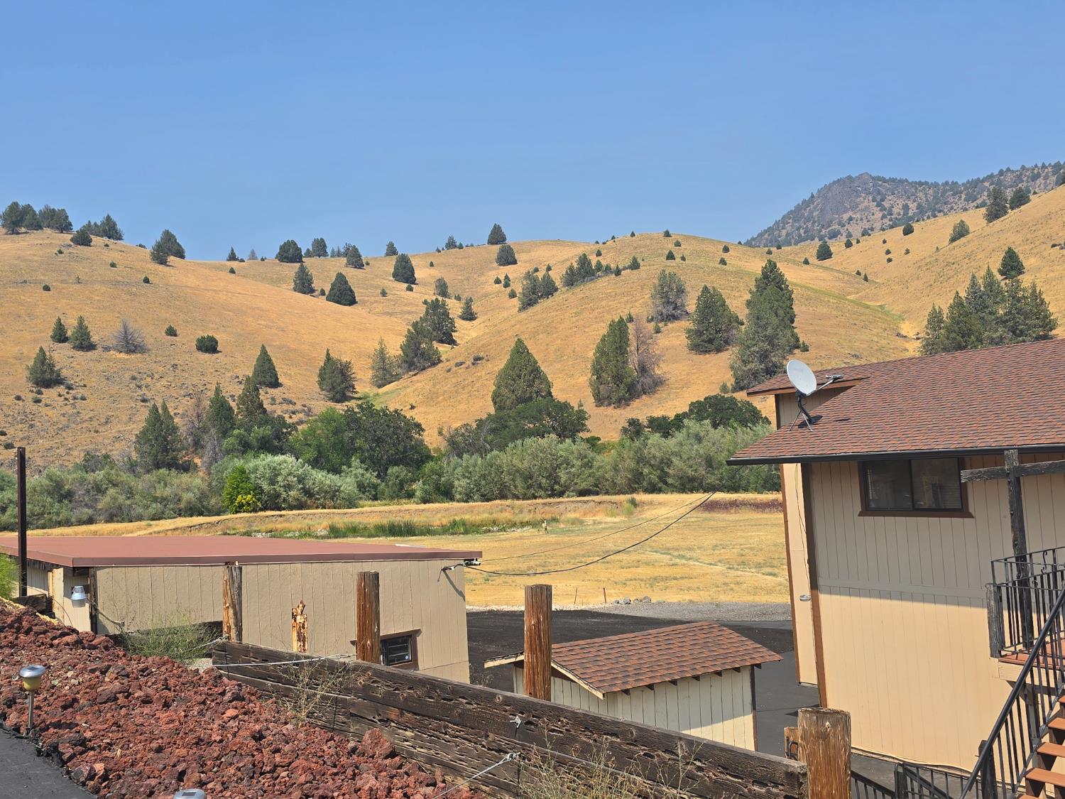 4204 Highway 263 Yreka, CA 96097 - Photo 3 of 66 a view of a terrace with a bench