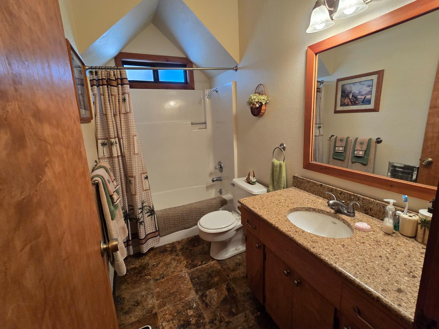4204 Highway 263 Yreka, CA 96097 - Photo 34 of 66 a bathroom with a granite countertop sink toilet and shower
