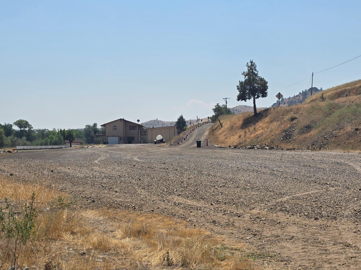 4204 Highway 263 Yreka, CA 96097 - Photo 52 of 66 a view of a dry field with trees in background
