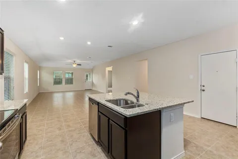 a view of a yard in front of a house with a yard