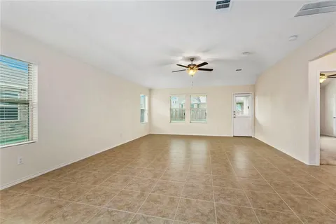 a kitchen with stainless steel appliances a refrigerator and a microwave