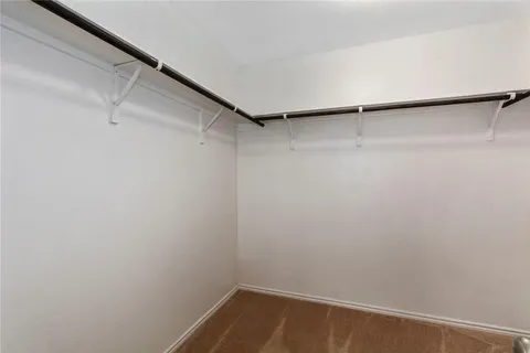 a bathroom with a sink a mirror and a bathtub