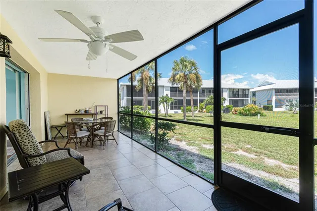 a view of a city from a dining room with furniture window and outside view