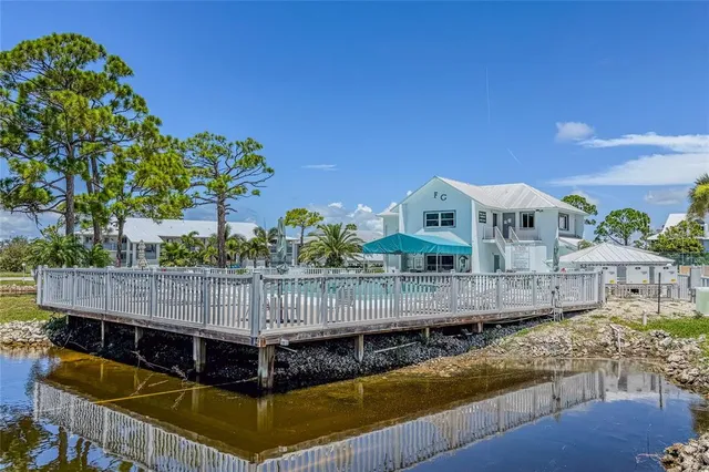 a view of balcony with furniture
