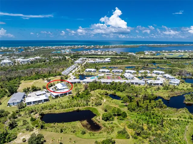 a view of a city with an ocean view