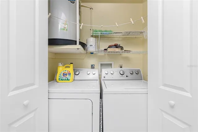 a utility room with dryer and washer