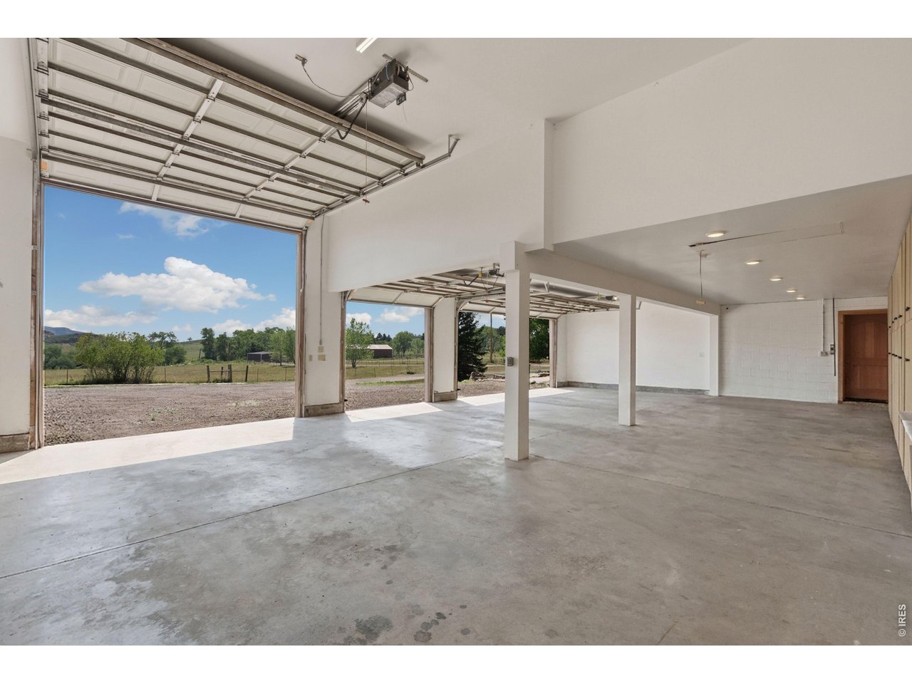 54 Rist View Road Bellvue, CO 80512 - Photo 25 of 50 Larger 12' x 12" overhead garage door!