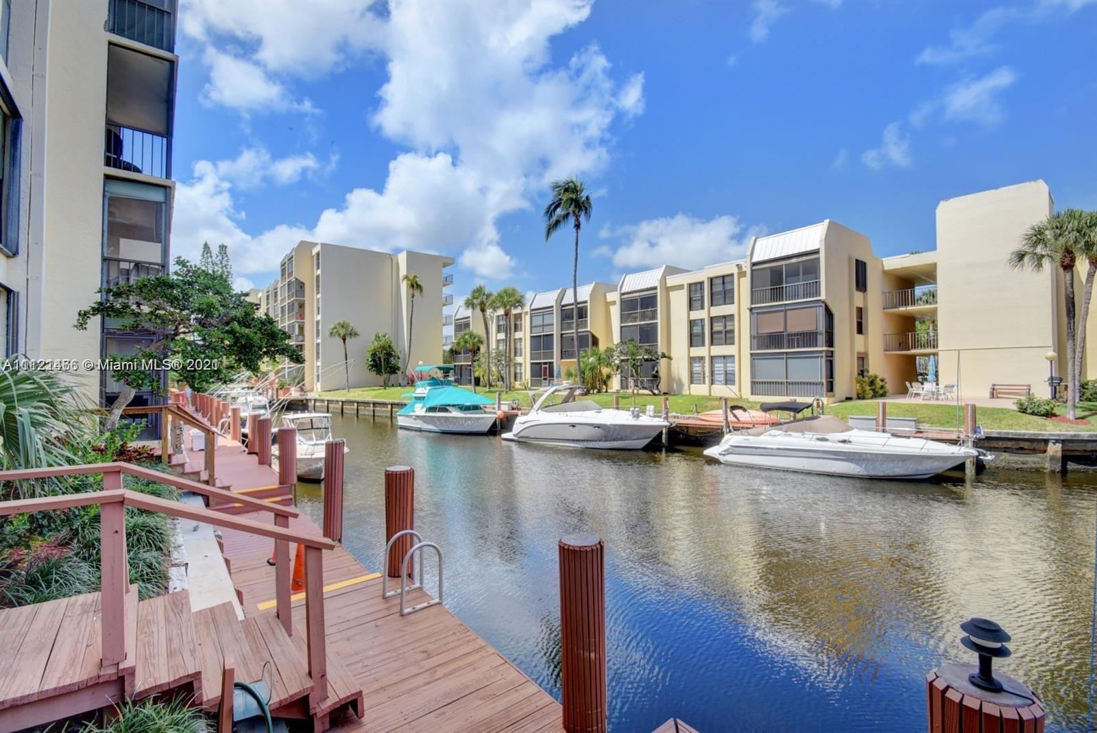 9 Royal Palm Way, Unit 6030 Boca Raton, FL 33432 - Photo 15 of 17 a view of swimming pool with outdoor seating