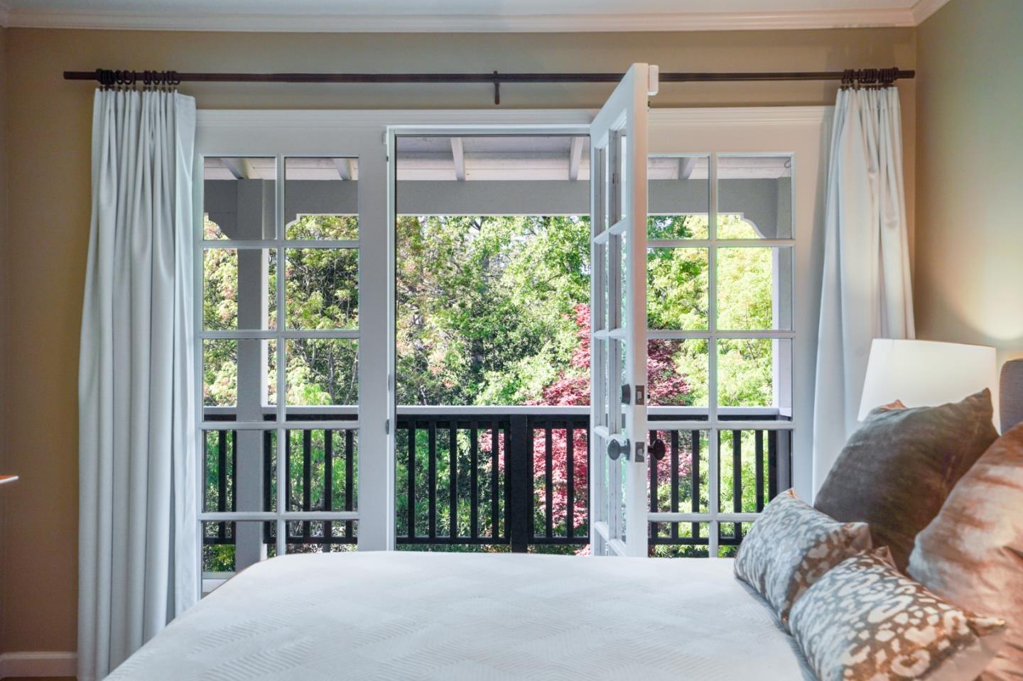 445 Walsh Road Atherton, CA 94027 - Photo 15 of 37 a bed sitting in front of a window
