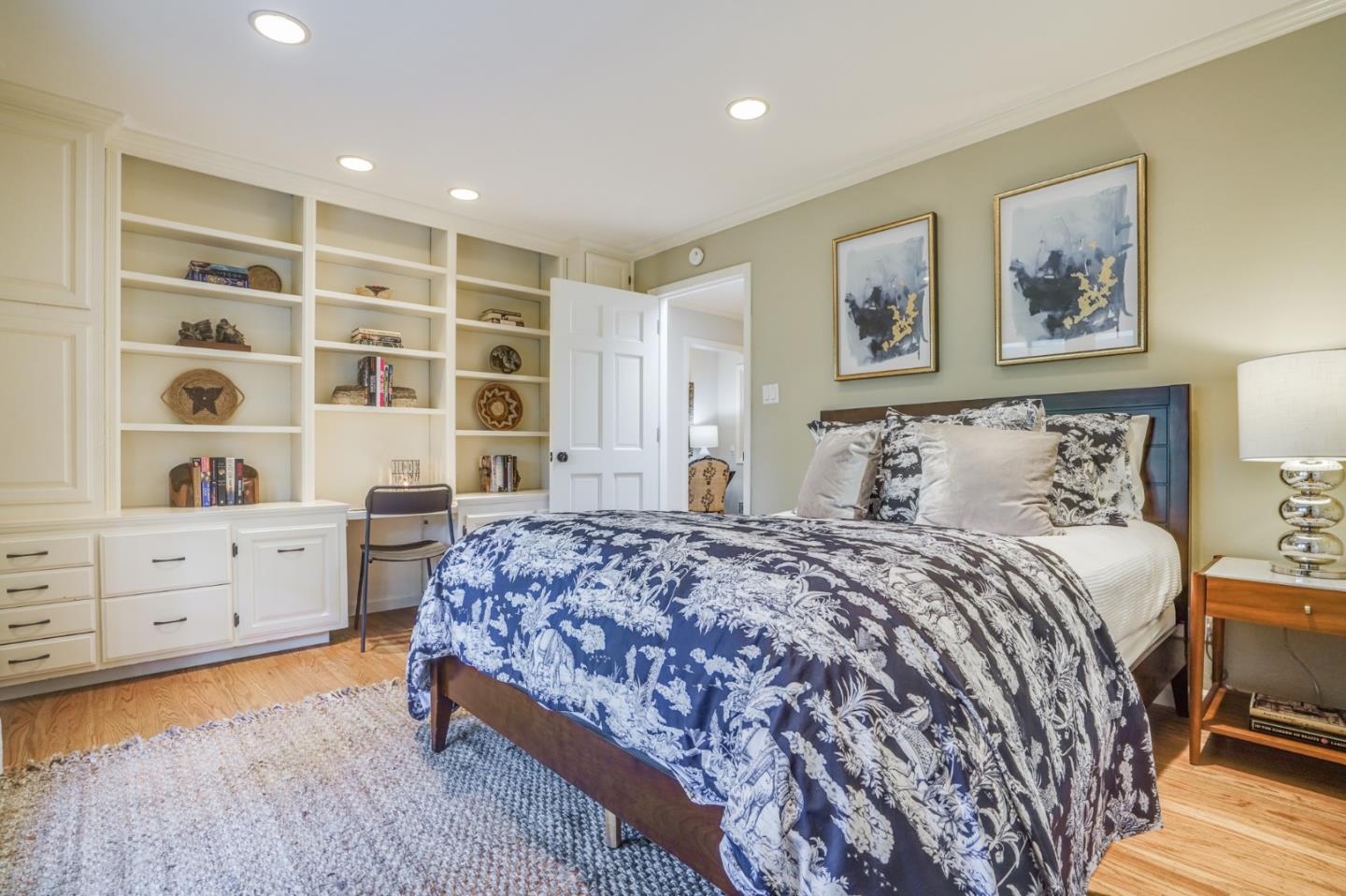 445 Walsh Road Atherton, CA 94027 - Photo 18 of 37 a bedroom with a bed and a cabinet