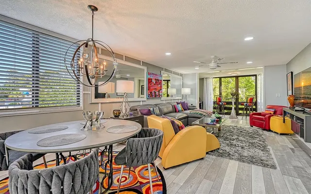 a very nice looking dining room with a table and chairs