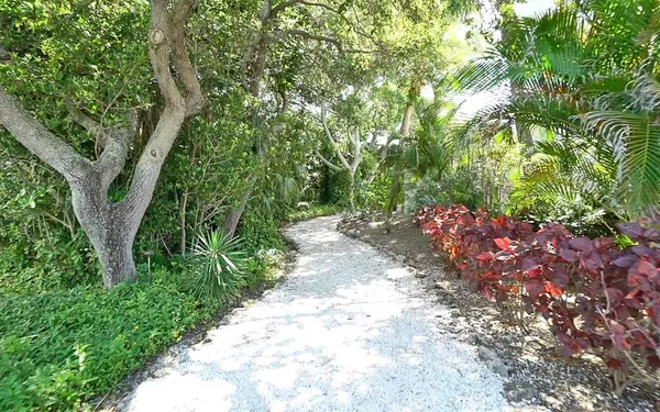 a childrens park with lots of swings and slides