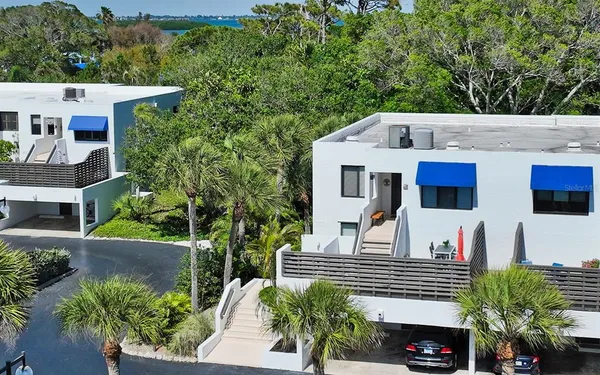 a view of building with outdoor space and river