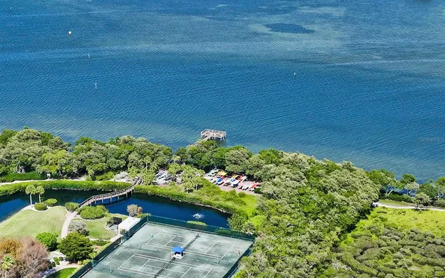 a view of building with outdoor space and river