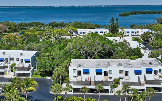 a view of a garden with an outdoor seating