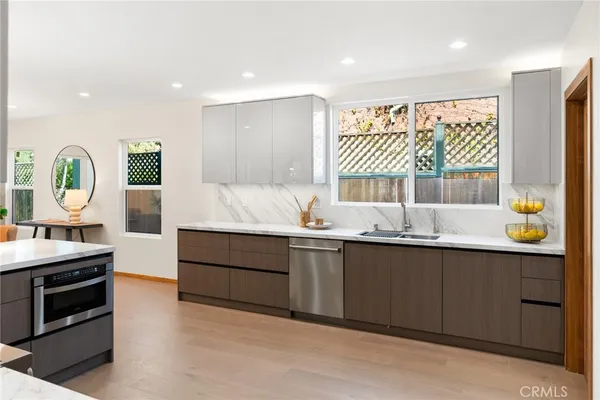 a large bathroom with a sink and a large mirror