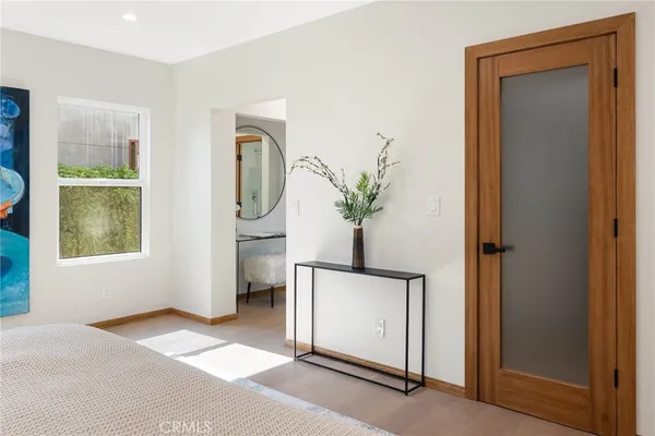 a view of livingroom with hardwood floor and a window