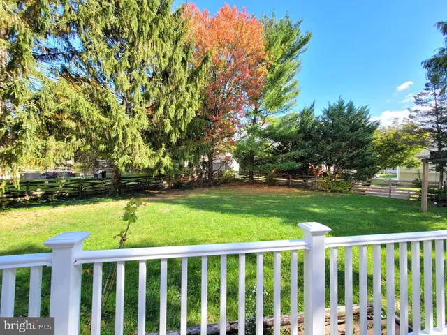 a view of a two chairs in the balcony