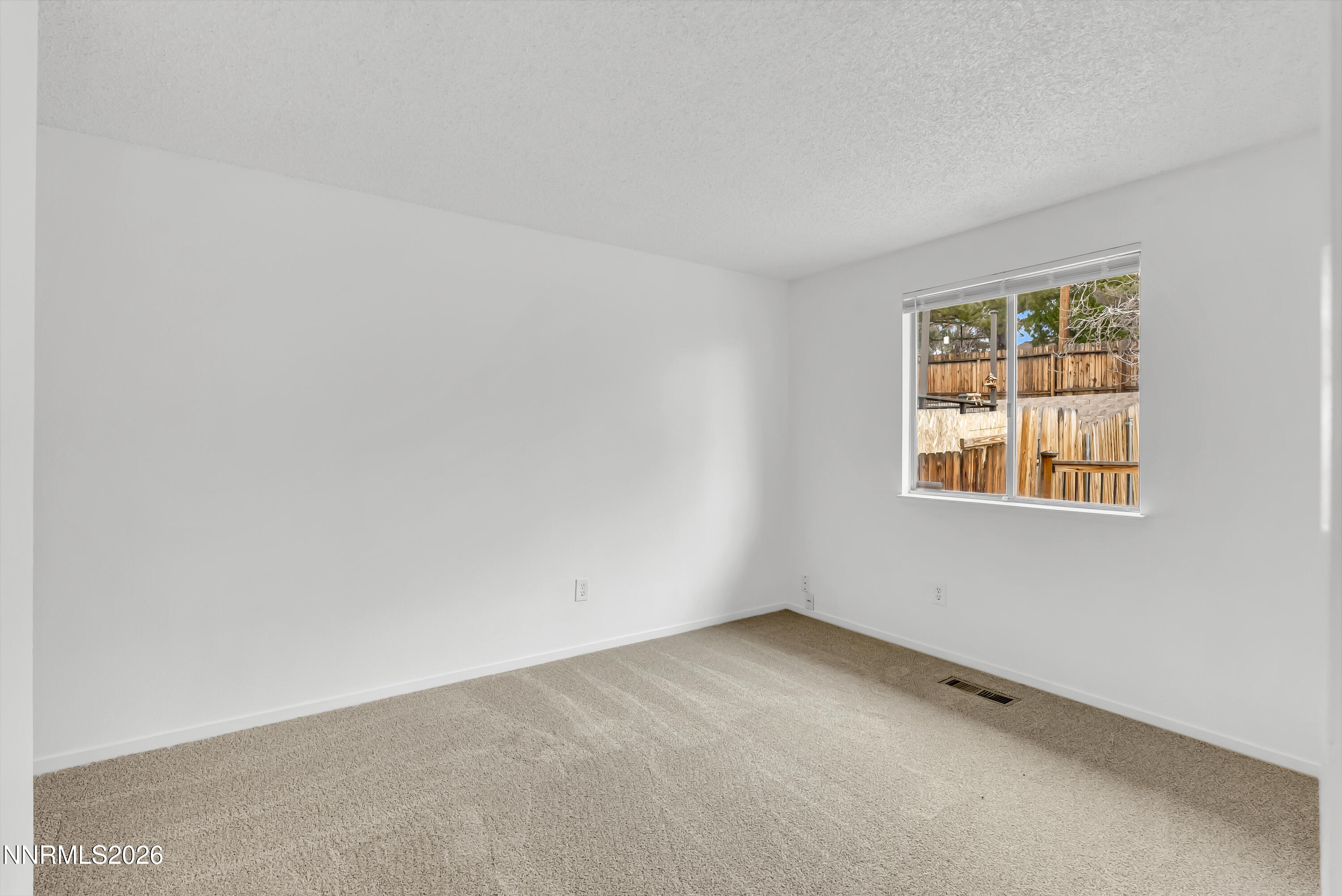 1045 Hartford Court Reno, NV 89503 - Photo 19 of 36 an empty room with a window