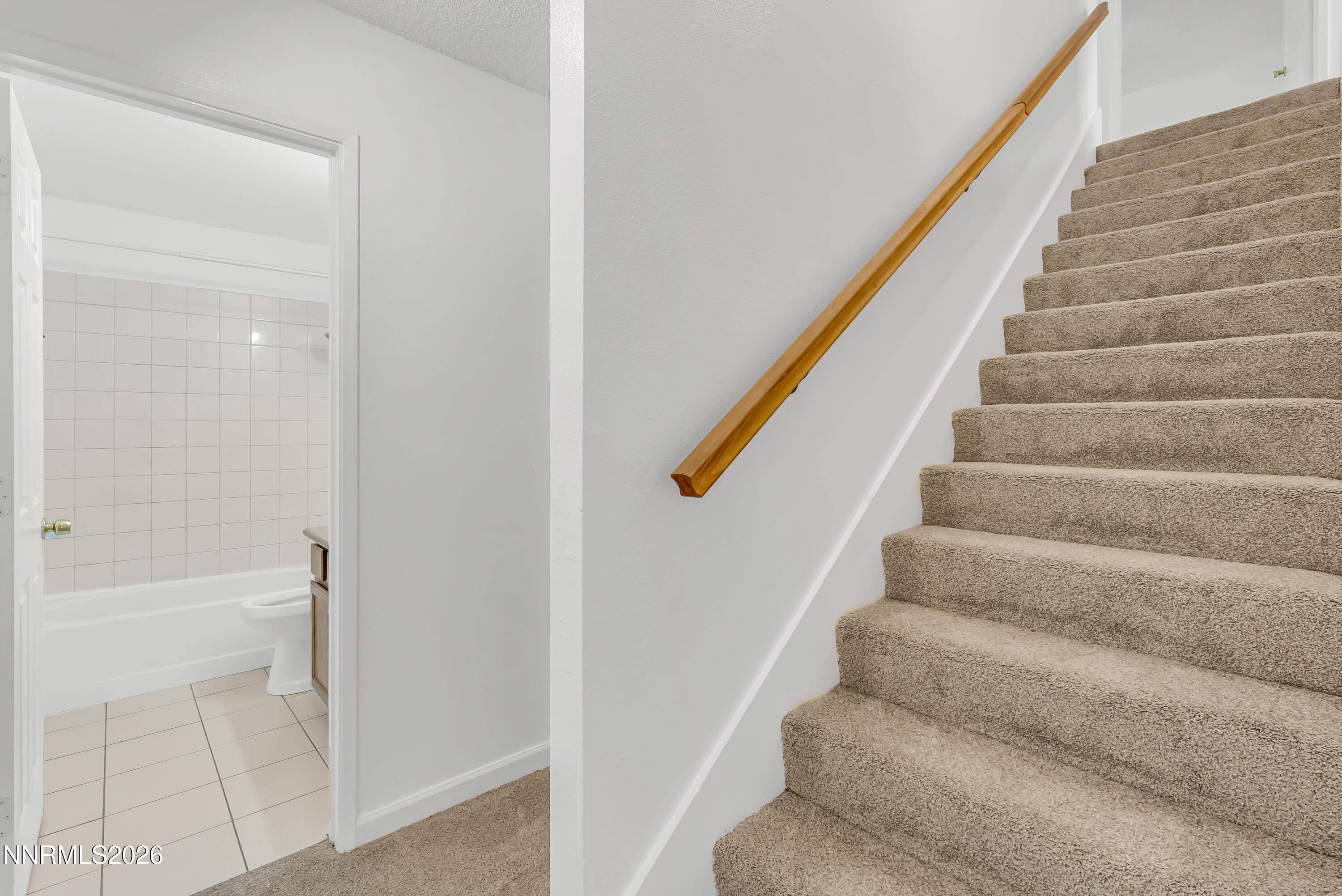1045 Hartford Court Reno, NV 89503 - Photo 21 of 36 a view of staircase with white walls and white door
