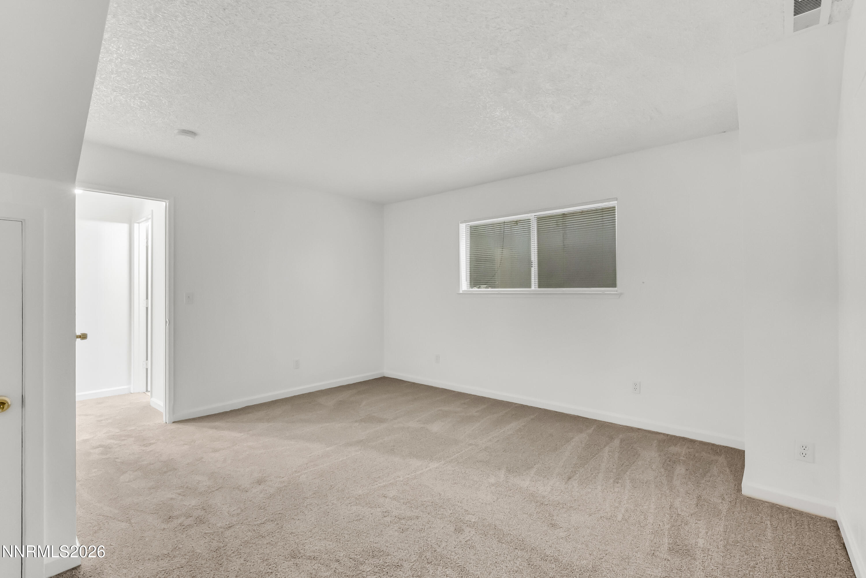 1045 Hartford Court Reno, NV 89503 - Photo 25 of 36 an empty room with windows