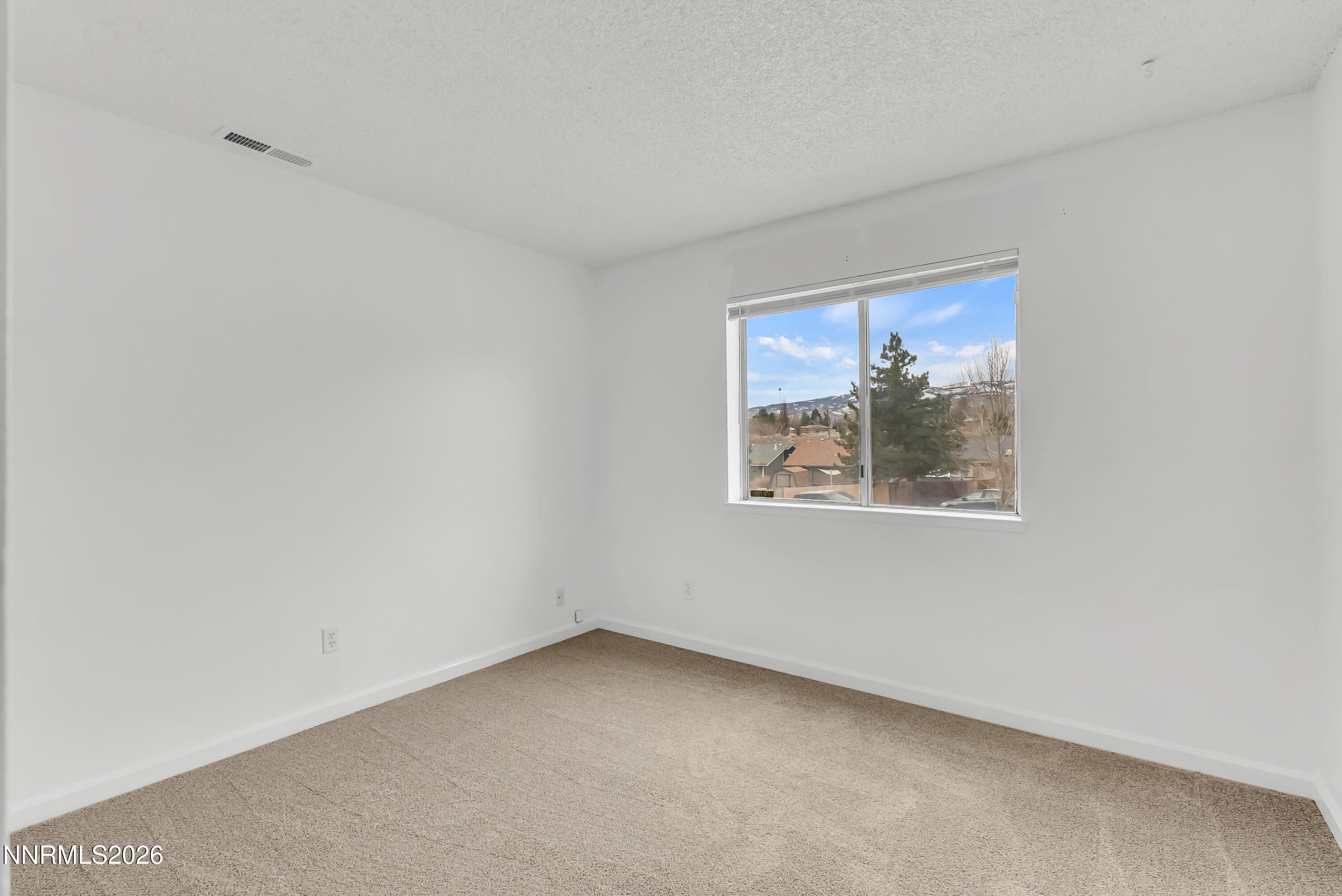 1045 Hartford Court Reno, NV 89503 - Photo 29 of 36 an empty room with a window