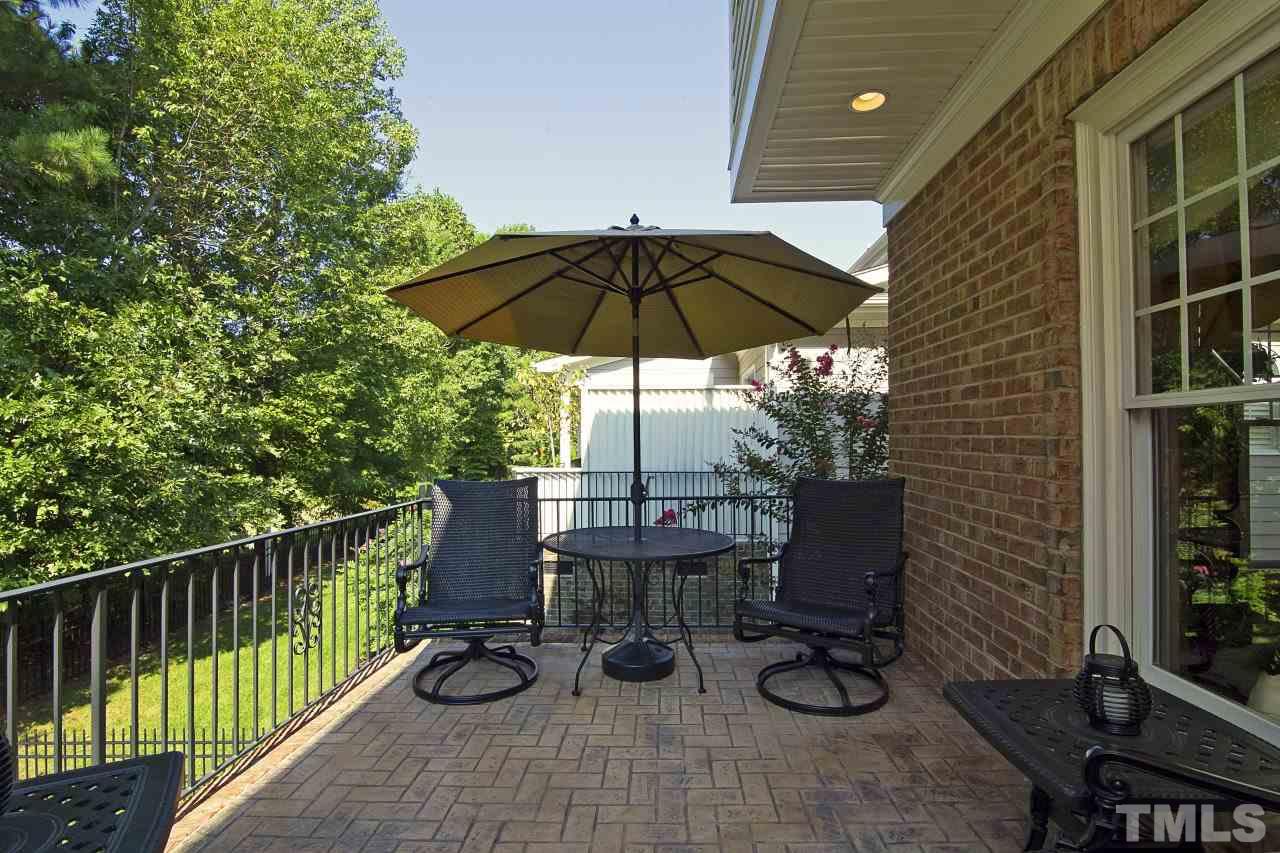 12301 Beestone Lane Raleigh, NC 27614 - Photo 12 of 25 a view of balcony with chairs and wooden fence