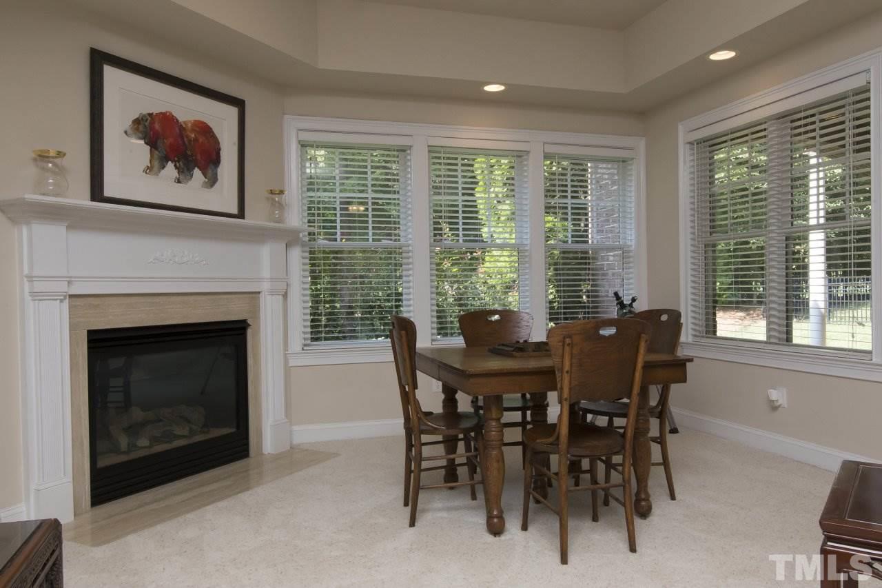 12301 Beestone Lane Raleigh, NC 27614 - Photo 22 of 25 a view of a dining room with furniture window and outside view