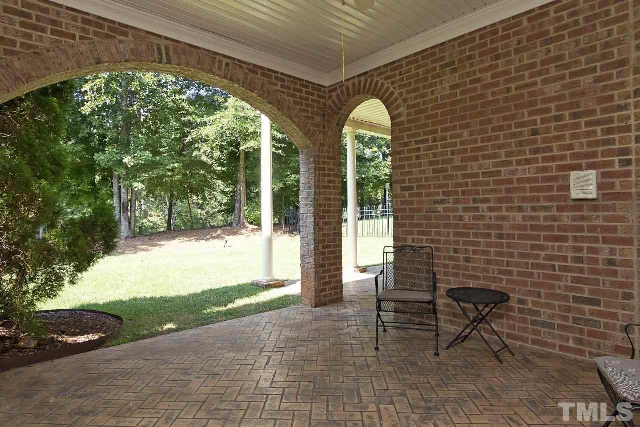 12301 Beestone Lane Raleigh, NC 27614 - Photo 25 of 25 a front view of a house with garden
