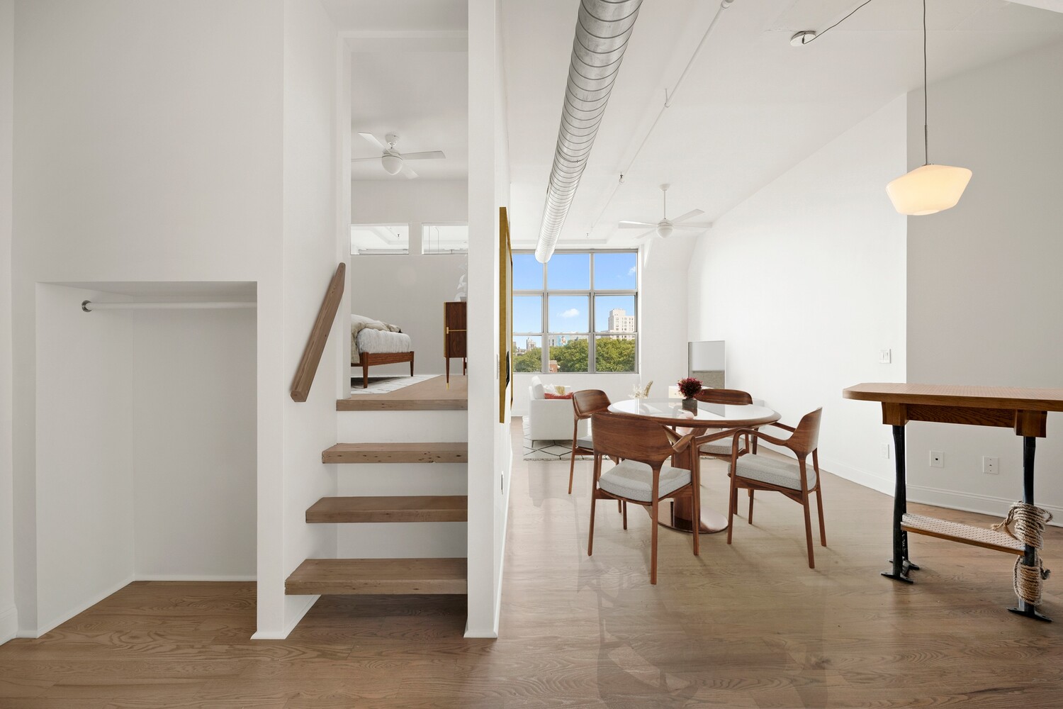 176 Johnson Street, Unit 7C Brooklyn, NY 11201 - Photo 5 of 15 a view of a livingroom with furniture and window