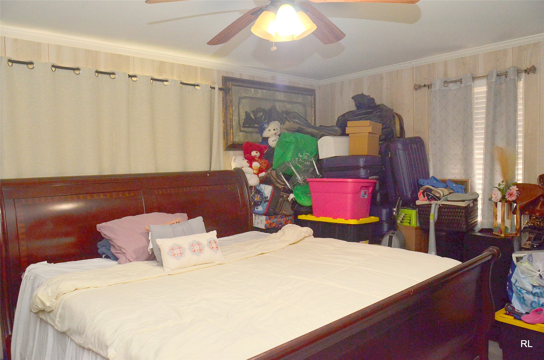 805 Avenue J Rosenberg, TX 77471 - Photo 17 of 22 a bed room with a bed mirror and a table