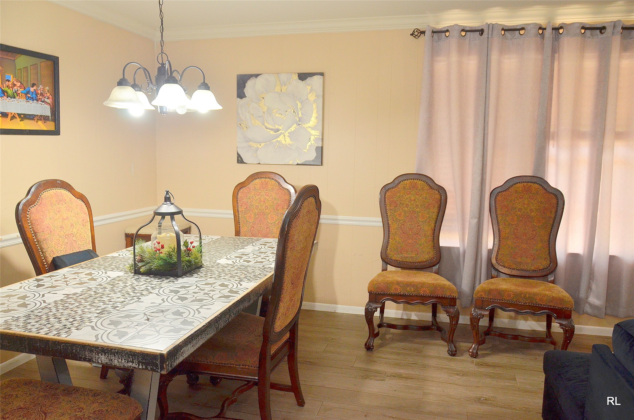 805 Avenue J Rosenberg, TX 77471 - Photo 7 of 22 a view of a dining room with furniture and wooden floor